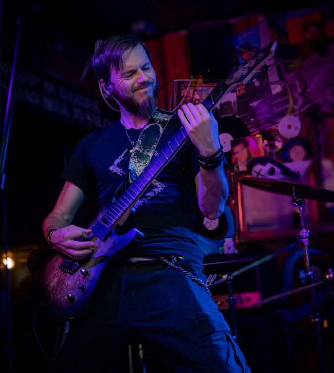 Vin signalling the breakdowns Vin shredding the guitar